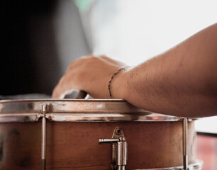 The drummer boy. A photo close up process play on a musical instrument drum