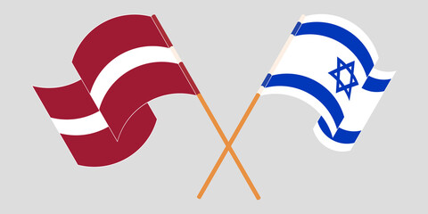 Crossed and waving flags of Israel and Latvia