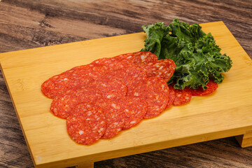Italian spycy pepperoni sausage slices