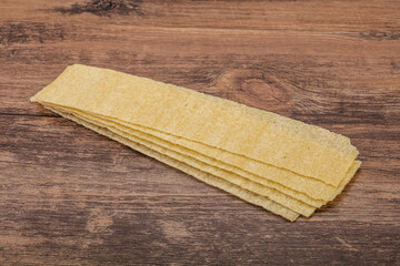 Natural salted potato chips heap