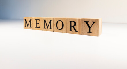 Memory text from wooden cubes. Photo was taken in white background.