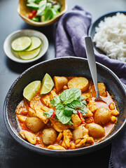 thai massaman curry with chicken and potatoes in bowl