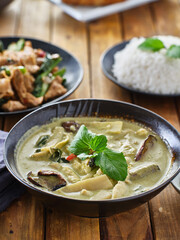 thai green curry with chicken and eggplant in bowl