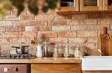 Kitchen background interior style scandinavian with glass jars and kitchen stove.