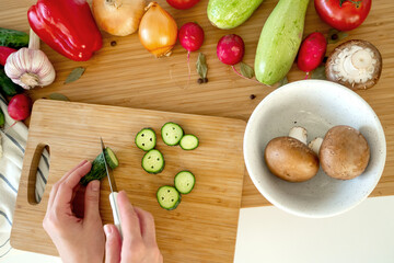 Healthy nutrition salad preparing concept. Various vegetables on the kitchen table