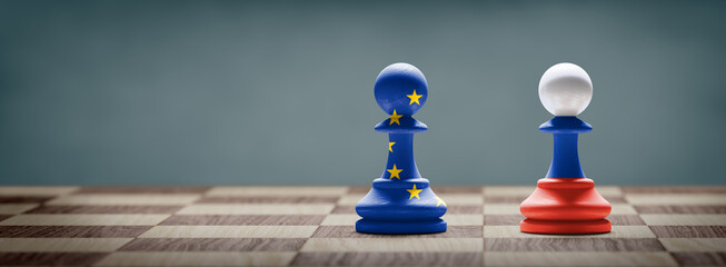 European Union and Russia conflict. Flags on chess pawns on a chess board.  - obrazy, fototapety, plakaty