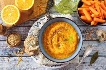 Vegetable carrot soup with orange juice, sesame and olive oil dressing