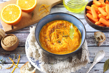 Vegetable carrot soup with orange juice, sesame and olive oil dressing