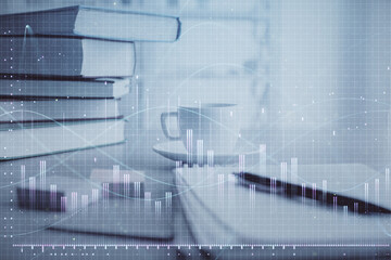 Double exposure of financial chart drawing and desktop with coffee and items on table background. Concept of forex market trading