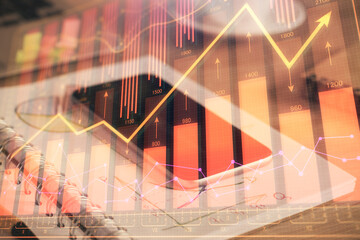 Double exposure of forex chart drawing and cell phone background. Concept of financial data analysis