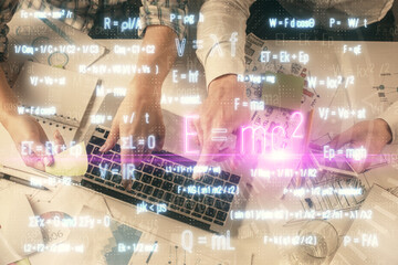 Double exposure of man and woman working together and formula hologram drawing. Computer background. Top View. Education concept.