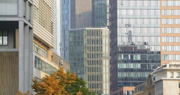 Locked down shot of modern office building facades in Frankfurt, Germany.