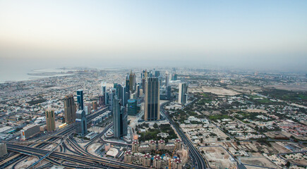 Fototapeta na wymiar View of Dubai from Burj Khalifa. Dubai, United Arab Emirates