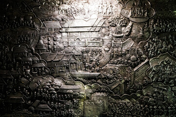 Chiang Mai, Thailand — wall of temple Wat Si Supan at night, carved decor, silver ship