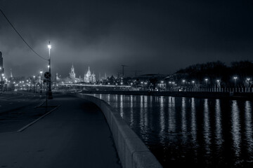 Fototapeta premium Night city in the fog, Moscow, Russia.