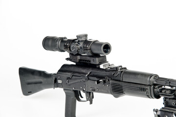 Weapon for hunting with a mounted optical sight, on a white background.