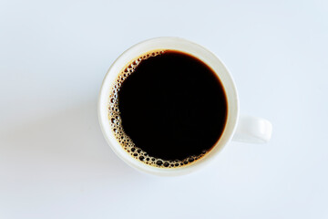 Top view cup of coffee on white background