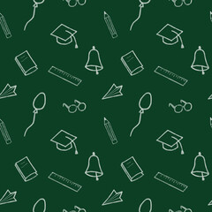 Seamless school pattern on a green background. Hand-drawn chalk drawings with school supplies.
