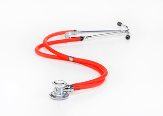 Red Stethoscope Isolated On White Background.