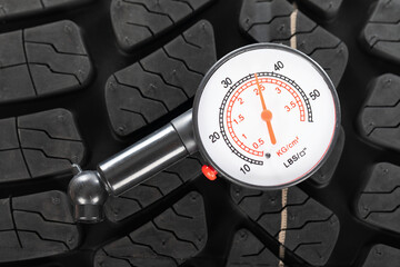 Picture of brand new black automobile tyre