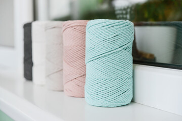 Macrame cotton cord spools in different pastel colors