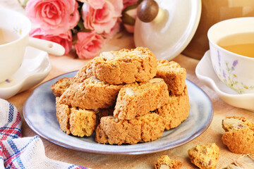 Classic Italian biscotti with almonds on wooden table 
