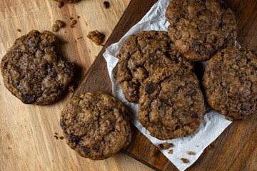 chocolate cookies on wooden table. top view, copy space