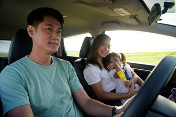 Asian familie are happy outside the car.insurance concept