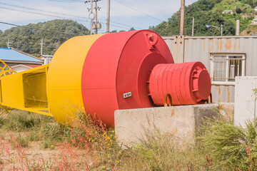 Red and yellow ocean buoy