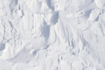 Fototapeta na wymiar Snow texture 2 - wobbly pits and striations and fine lines with more shadow