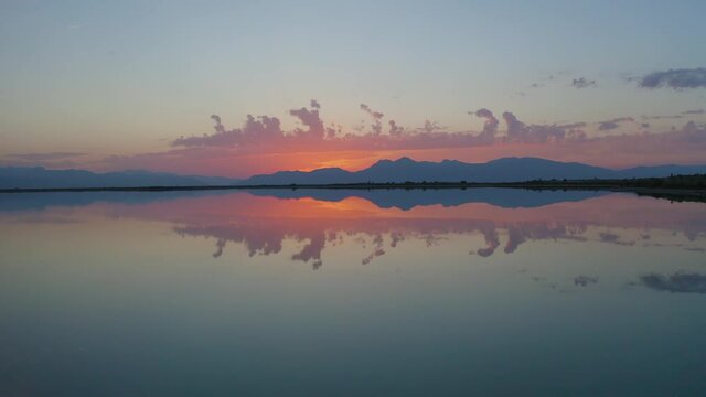 Aerial view of a swamp oasis in the mexican desert of cuatro cienegas in Coahuila. Sky with clouds reflected on water. RAMSAR protected area.