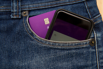 Close up of credit card and work and social security card (Carteira de trabalho). Formal employment concept. Translate: Ministry of Labor and Employment / Caixa - Checking account, debt.