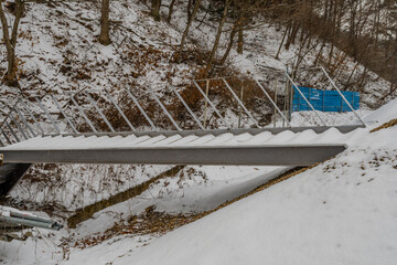 Metal staircase covered in snow