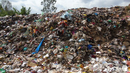 pile of garbage in landfill