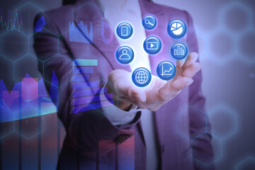 Woman demonstrating icons of data management system and digital charts, closeup