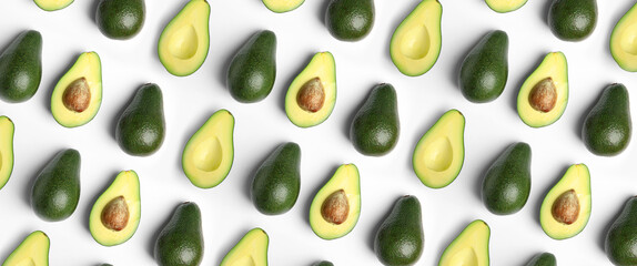 Flat lay composition with fresh ripe avocados on white background, banner design