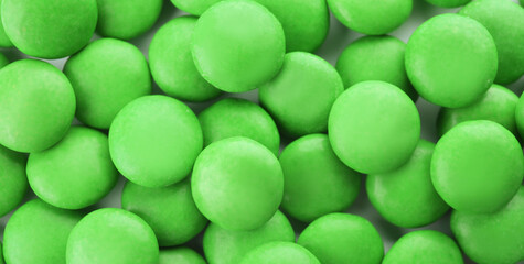 Many colorful candies as background, top view. Banner design