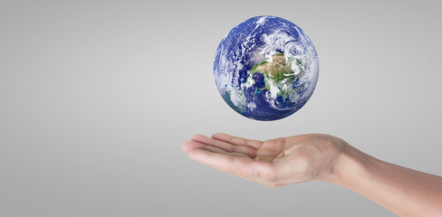 Globe, earth in human hand. Earth image provided by Nasa