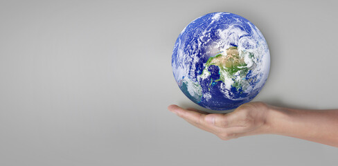 Globe, earth in human hand. Earth image provided by Nasa