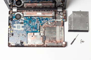 Details of disassembled laptop on white background, notebook repair concept