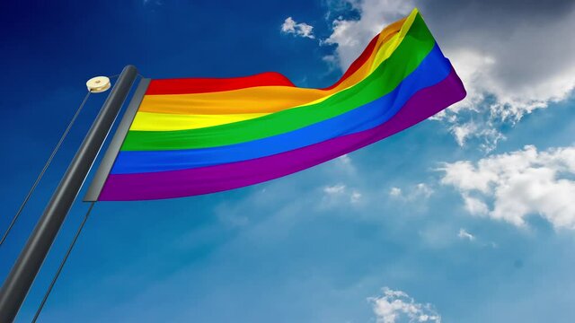 A natural waving flag with a blue sky background of LGBTI