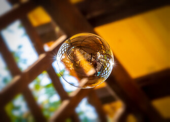 A large soap bubble is launched on the veranda.