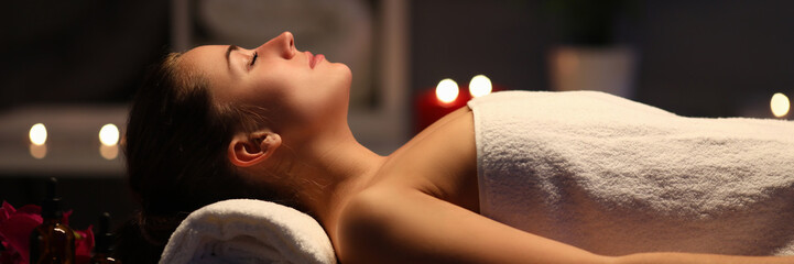 Girl preparing for spa treatments in fashion salon. Effective and enjoyable way to take care your...
