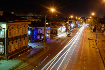 Fototapeta premium 130 Kvartal quarter, Irkutsk Sloboda is a specially created area of historic buildings in the center of Irkutsk, Russia. View from top at night