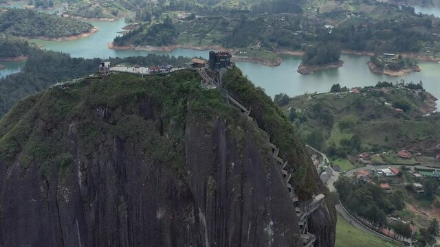 Piedra del Peñol in Guatapé Columbia Aerial Shot With River in Background