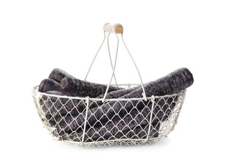 Obraz premium Raw black carrots in metal basket isolated on white