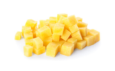 Raw yellow carrot cubes isolated on white
