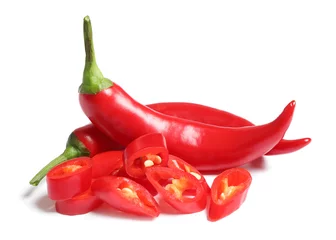 Gardinen Chilischoten Cut and whole red hot chili peppers on white background  © New Africa