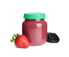 Jar with baby food, strawberry and dried plum on white background
