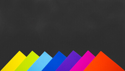colored paper on black